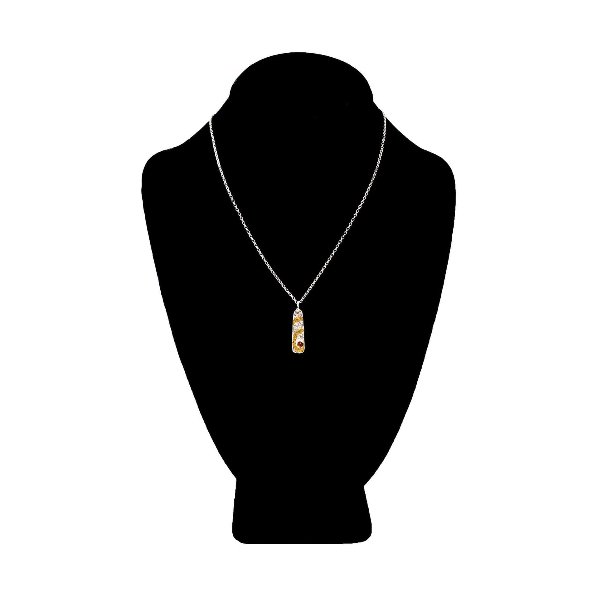 An Ghrian Pendant on black velveteen bust by Atlantic Rose